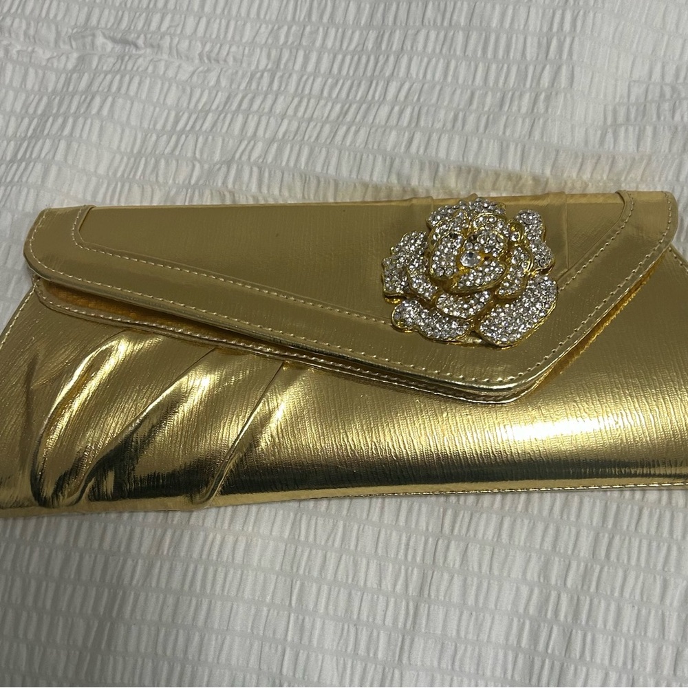 Elegant Gold Clutch with Floral Accent